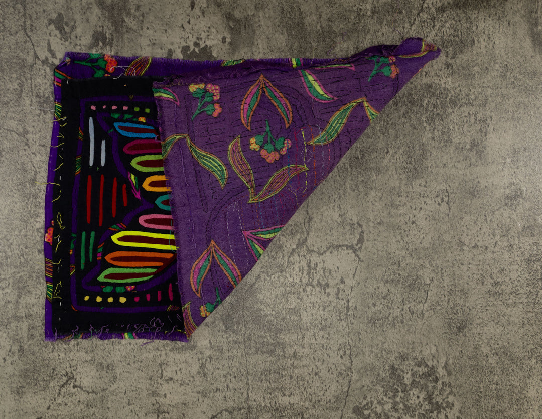 Hand stitched Guna mola from Guna Yala Panama, condor edged in purple with short color bars