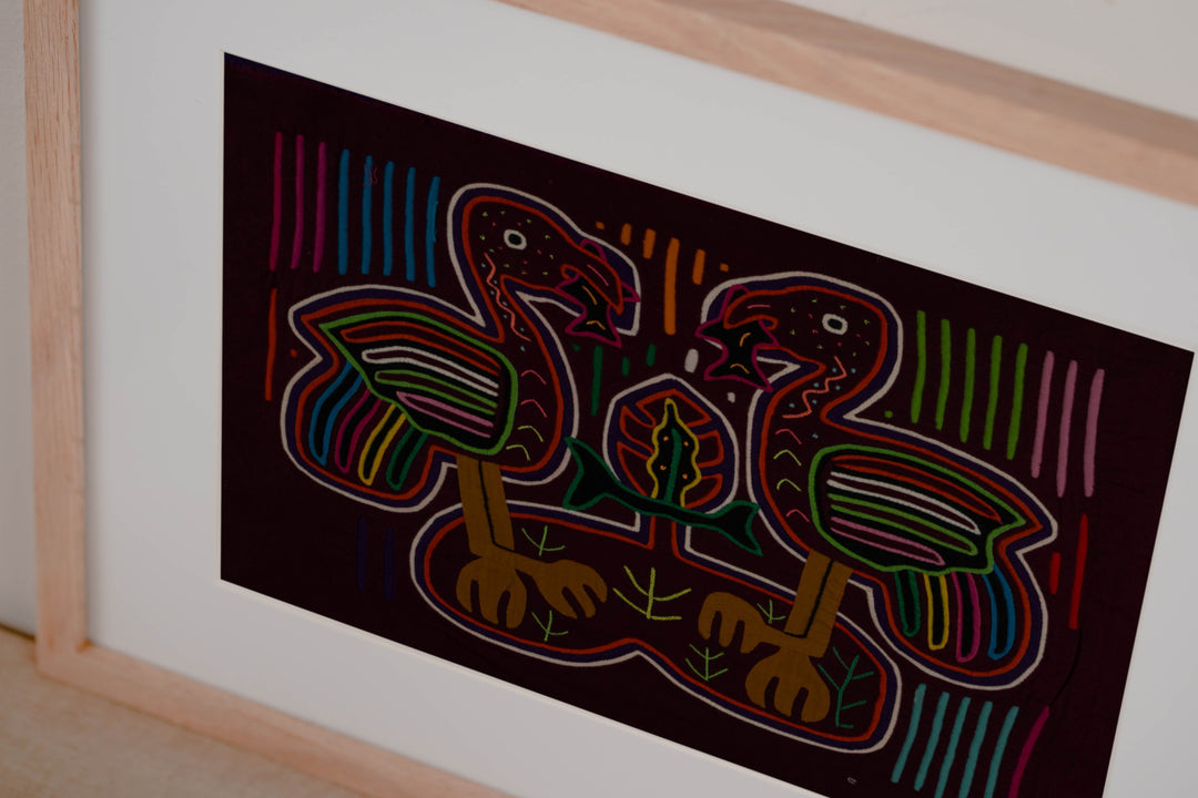Maroon And White Heron Bird With Fish Mola