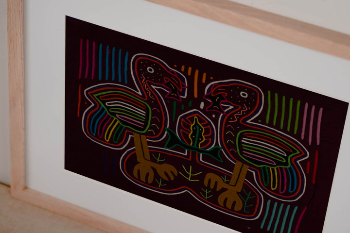Maroon And White Heron Bird With Fish Mola