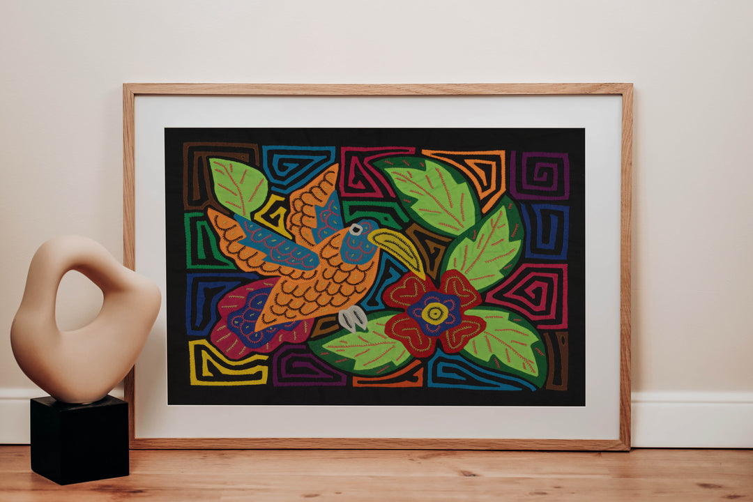 Colorful Hummingbird Feeding on Flower Mola