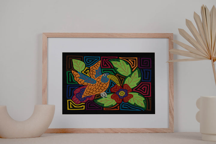 Colorful Hummingbird Feeding on Flower Mola