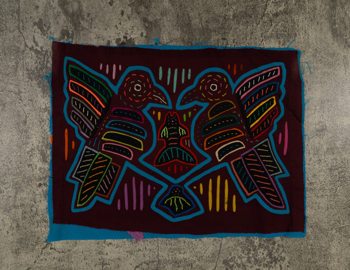 Maroon And Turquoise Kingfisher With Fish Mola