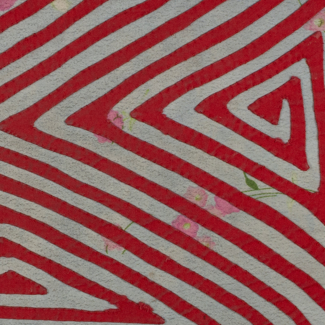 Red and gray floral background hourglass mola, hand stitched Guna panel from Panama, 16 by 11 inches