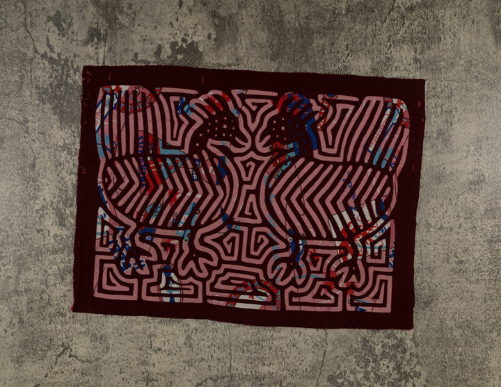 Panama mola panel, two goonie birds with chevron bodies and fan tails, hand stitched reverse applique
