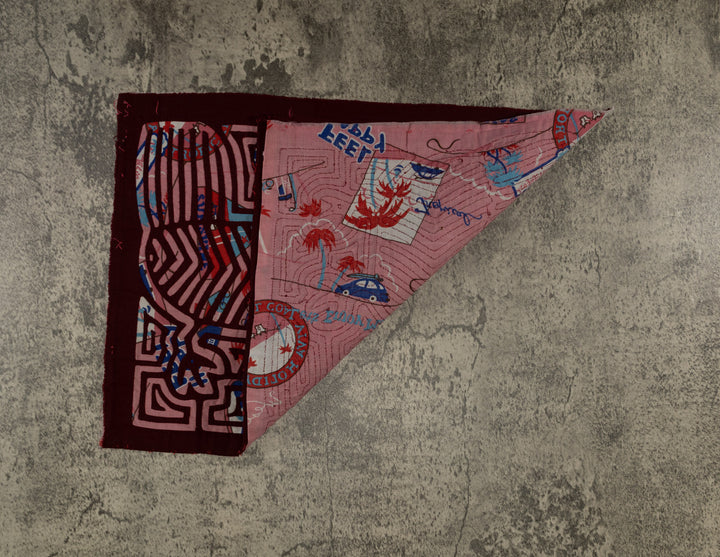 Hand stitched Guna mola from Guna Yala Panama, mirrored birds over a printed background cloth