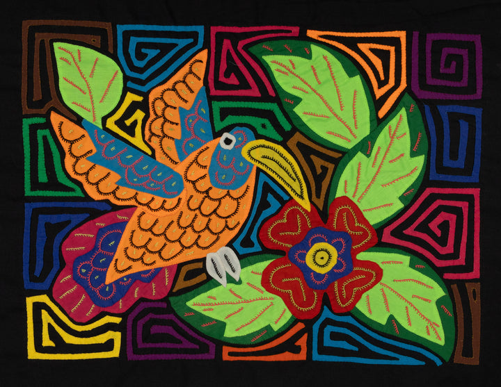 Colorful Hummingbird Feeding on Flower Mola