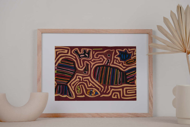 Panama mola panel, striped turkeys strutting among light orange maze lines, hand stitched reverse applique