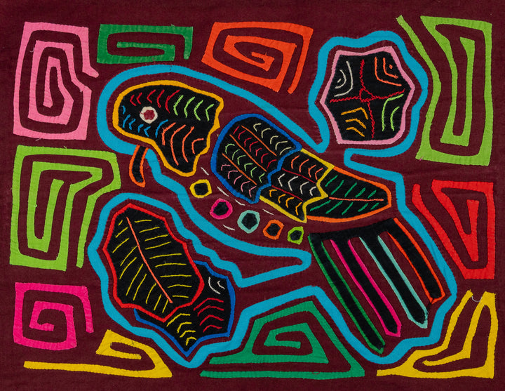 Parrot with a bitty beak mola, hand stitched Guna panel from Panama, 16 by 13 inches