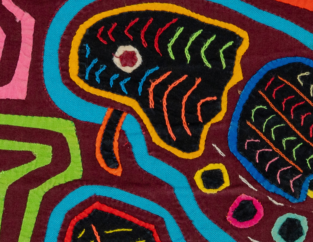 Parrot with a bitty beak mola, hand stitched Guna panel from Panama, 16 by 13 inches