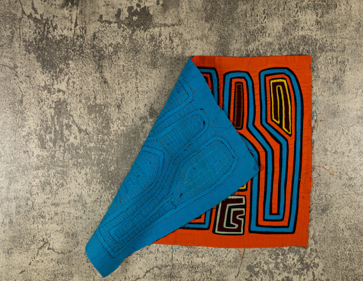 Hand stitched Guna mola from Guna Yala Panama, stripes running up each fork shape