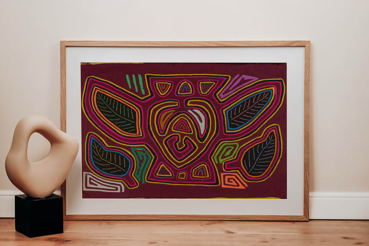 Panama mola panel, bumblebee shape with leaf wings outlined in pink on maroon, hand stitched reverse applique