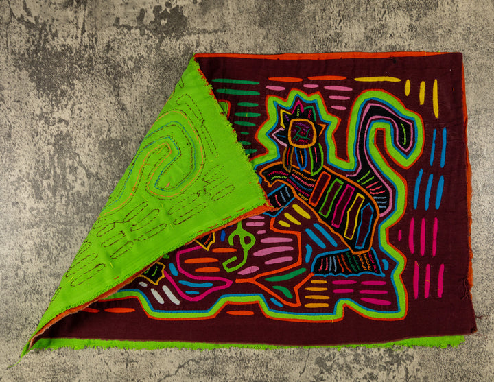 Hand stitched Guna mola from Guna Yala Panama, lime outlines on the striped bodies