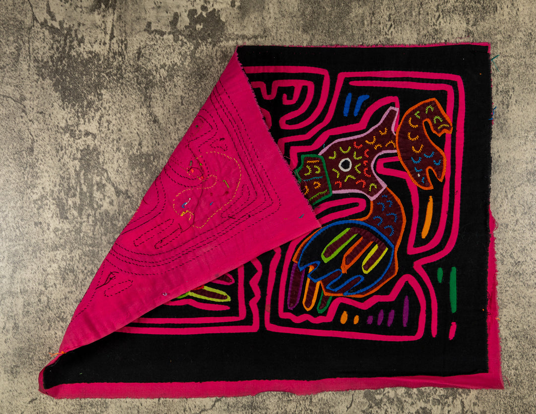 Hand stitched Guna mola from Guna Yala Panama, a fish at the tip of each beak