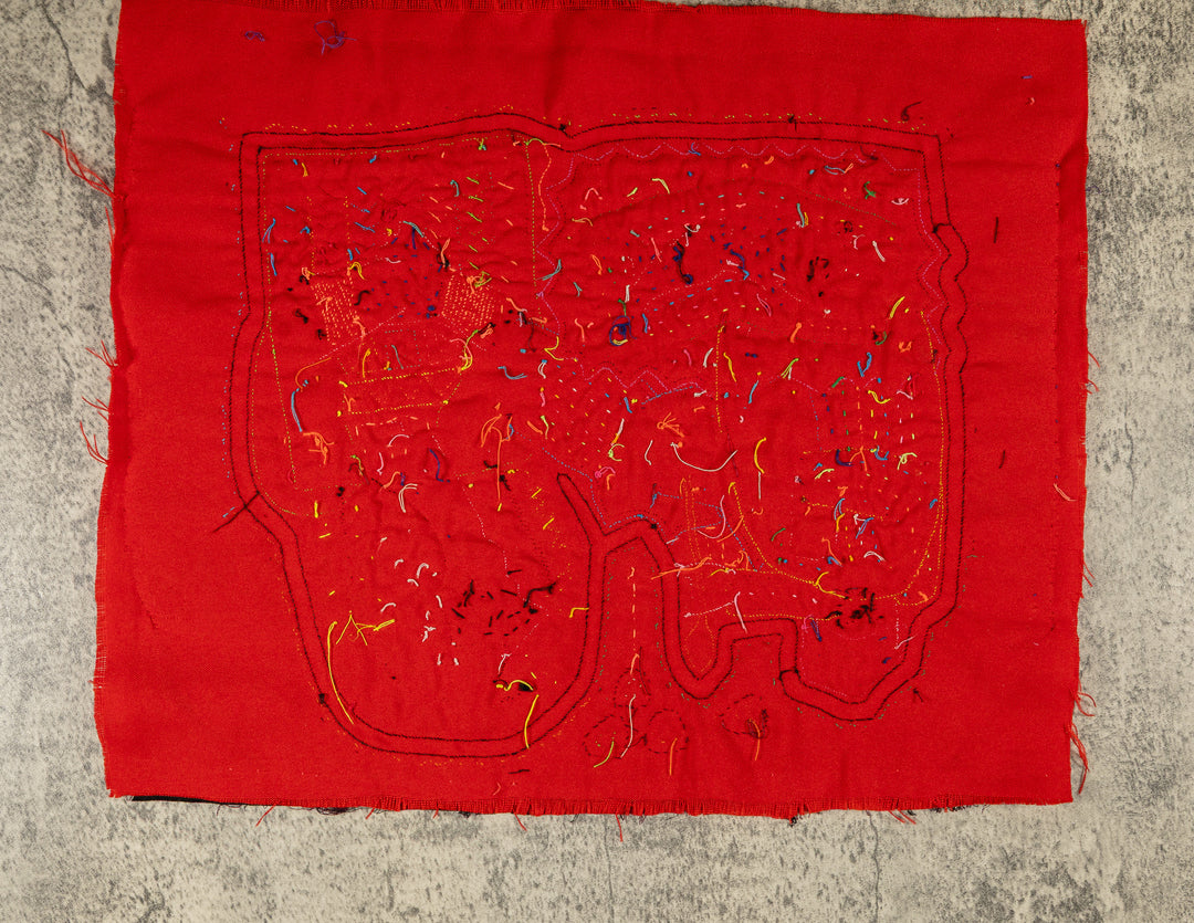 Nativity with women and baby mola, hand stitched Guna panel from Panama, 14 by 12 inches