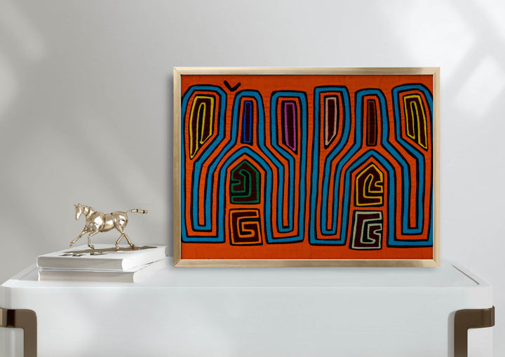 Panama mola panel, tall tuning fork shapes in blue and orange stripes, hand stitched reverse applique