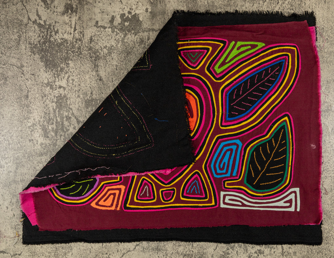Hand stitched Guna mola from Guna Yala Panama, a bee flying through leaves