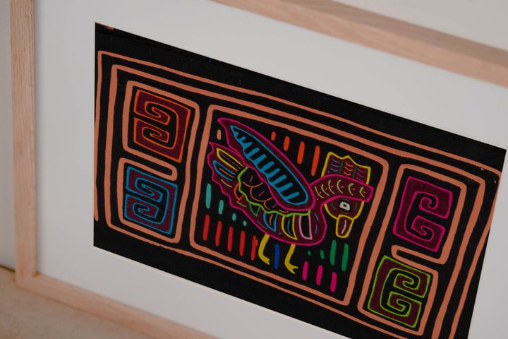 Hand stitched Guna mola from Guna Yala Panama, sweeping blue tail feathers