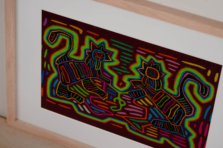 Hand stitched Guna mola from Guna Yala Panama, lime outlines on the striped bodies