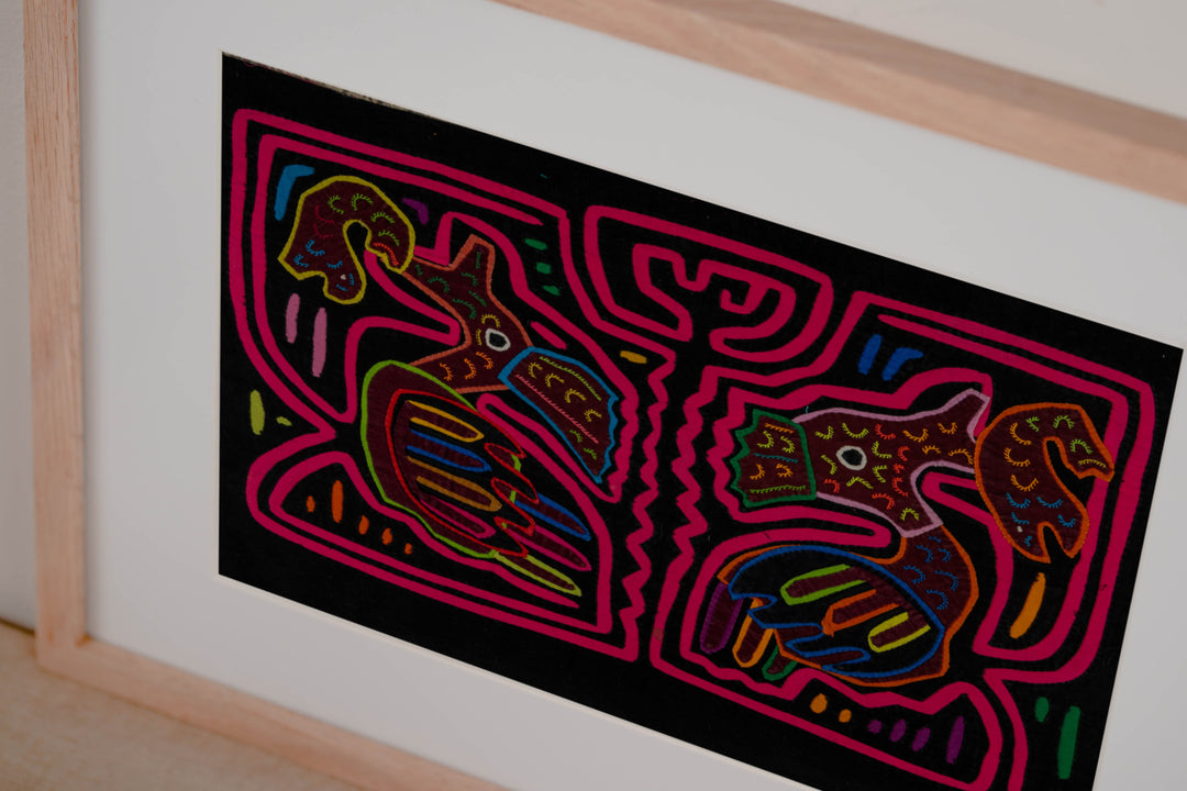 Hand stitched Guna mola from Guna Yala Panama, a fish at the tip of each beak