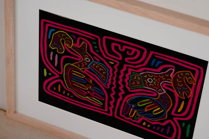 Hand stitched Guna mola from Guna Yala Panama, a fish at the tip of each beak