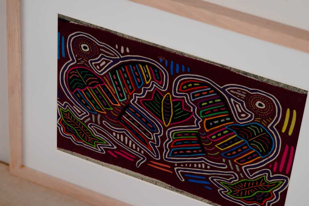 Hand stitched Guna mola from Guna Yala Panama, white outlines on the huge bills