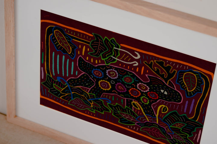 Hand stitched Guna mola from Guna Yala Panama, spiral spots across the body