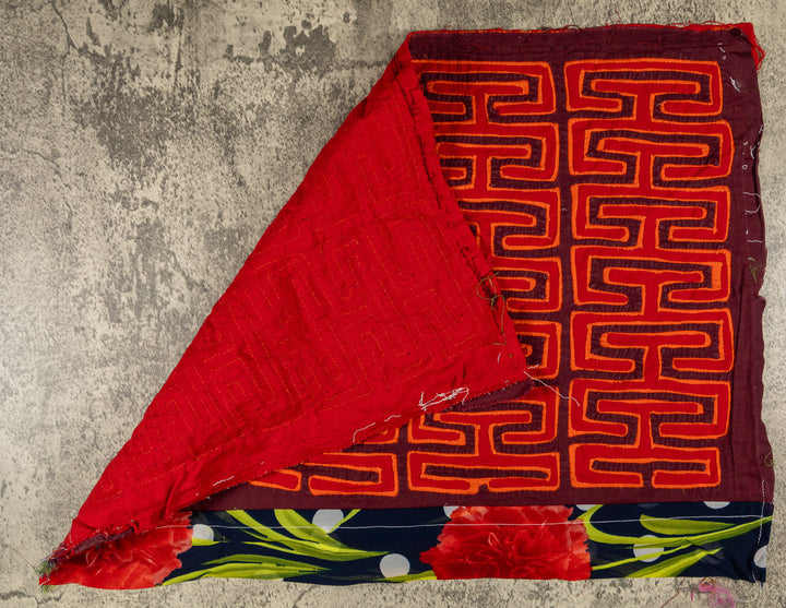 Hand stitched Guna mola from Guna Yala Panama, band of flowers along the lower edge
