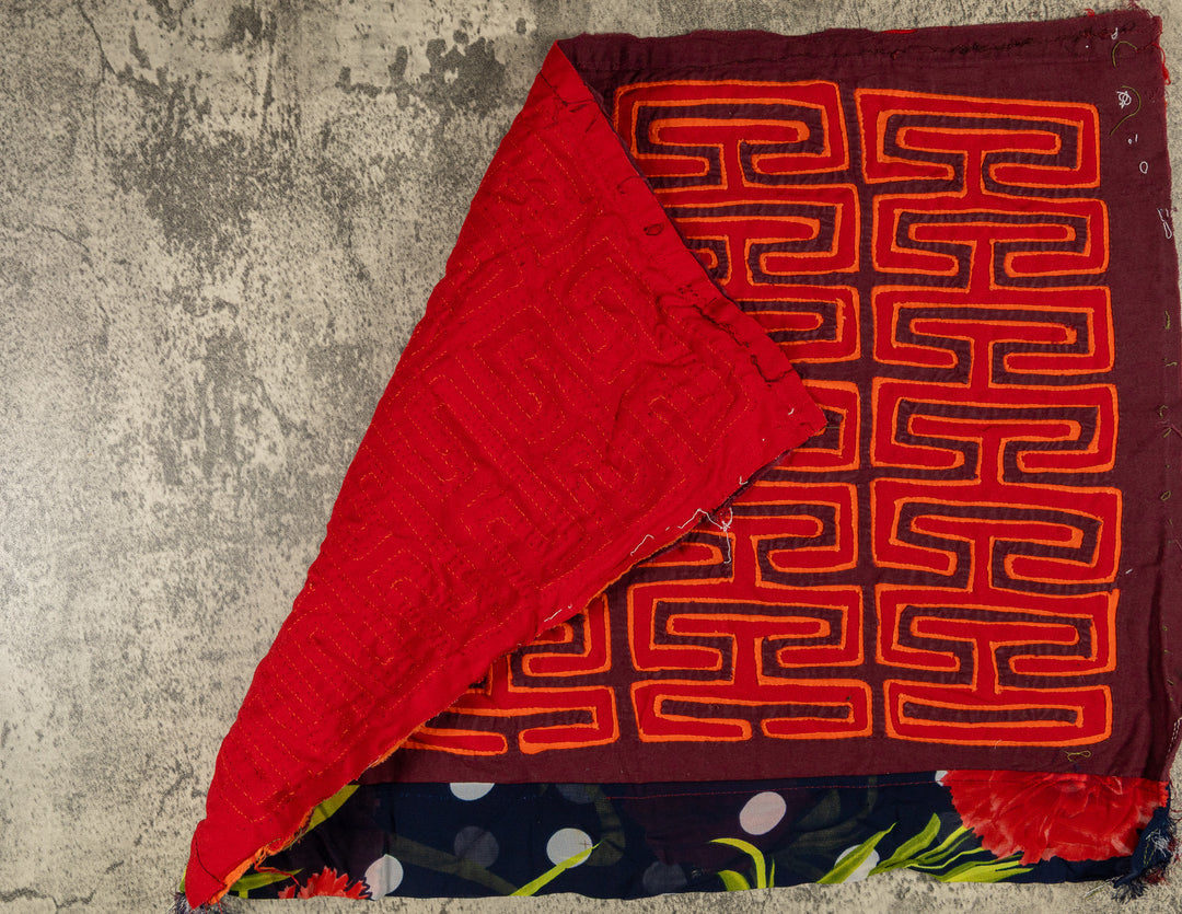Hand stitched Guna mola from Guna Yala Panama, flowered strip along the lower edge