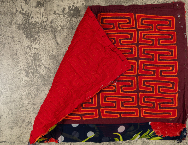 Hand stitched Guna mola from Guna Yala Panama, flowered strip along the lower edge