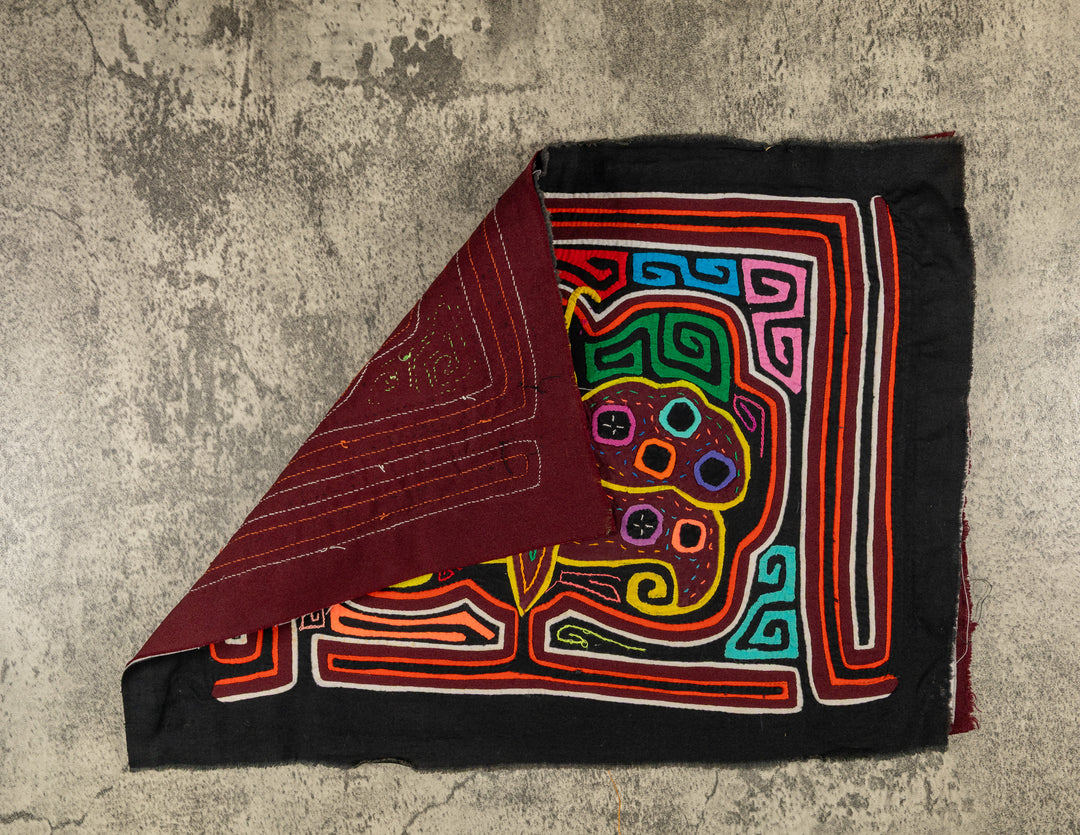Hand stitched Guna mola from Guna Yala Panama, polka dots across the wings