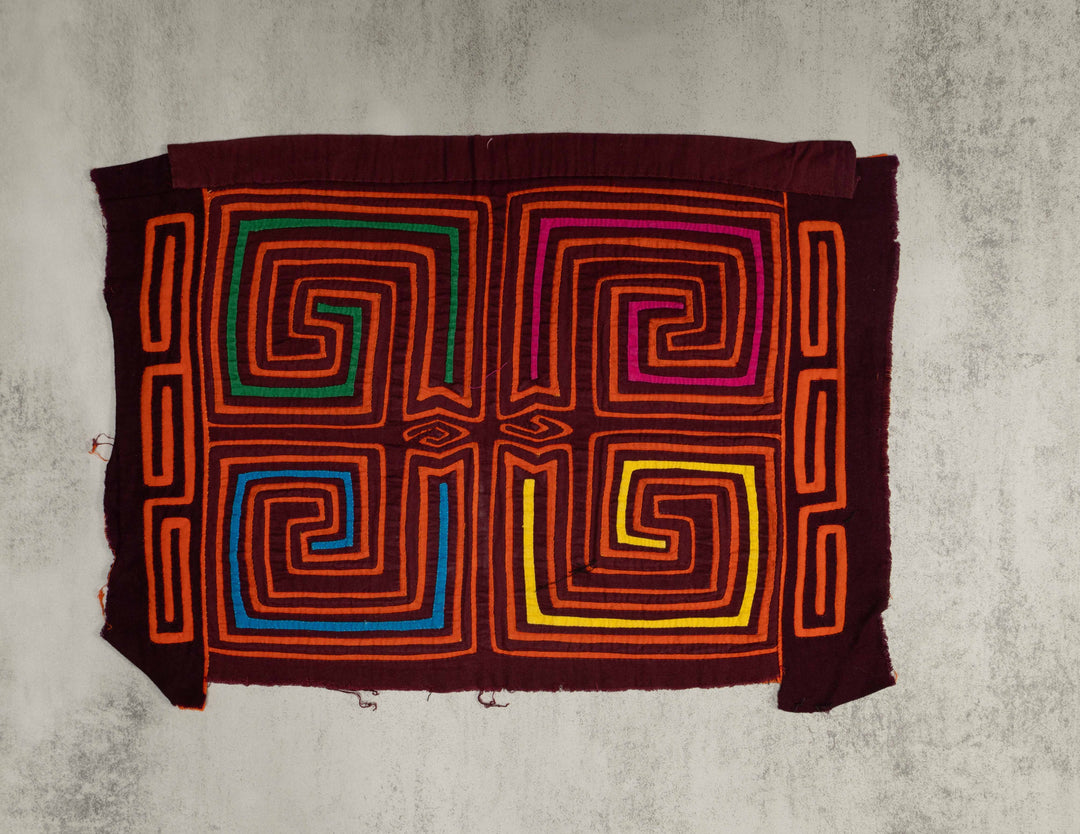 Panama mola panel, four spirals with colored inner lines, hand stitched reverse applique