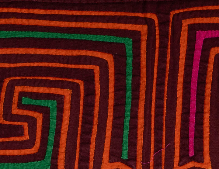 Panama mola panel, four spirals with colored inner lines, hand stitched reverse applique