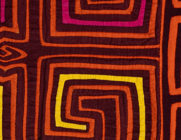 Maroon and orange four square spirals mola, hand stitched Guna panel from Panama, 15 by 11 inches