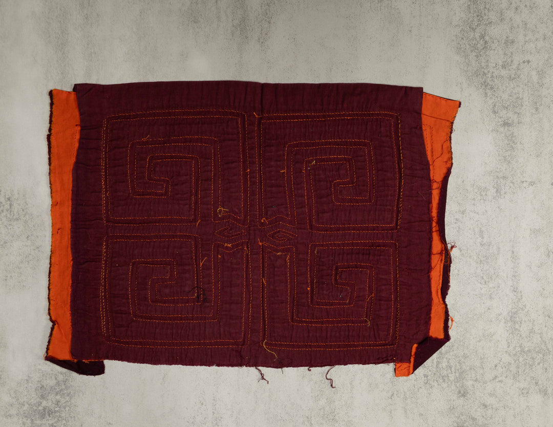 Maroon and orange four square spirals mola, hand stitched Guna panel from Panama, 15 by 11 inches