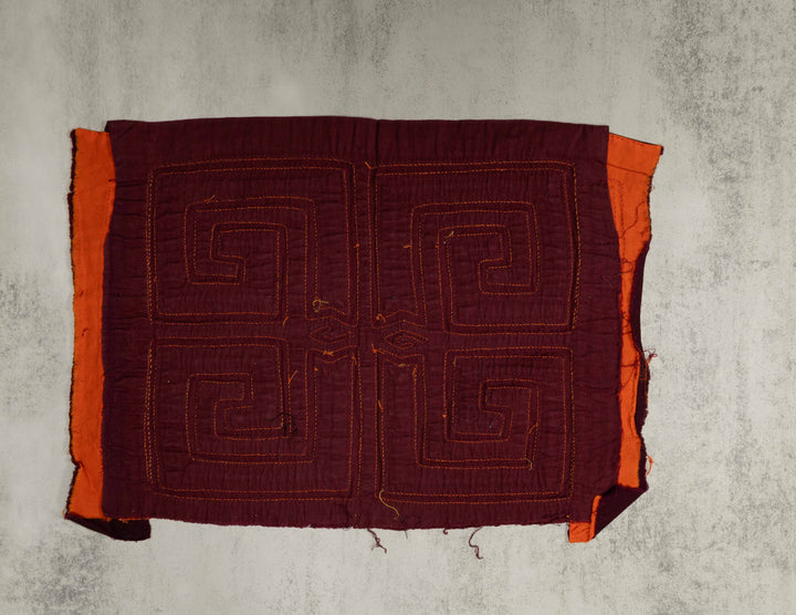 Maroon and orange four square spirals mola, hand stitched Guna panel from Panama, 15 by 11 inches
