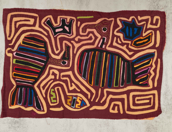 Panama mola panel, striped turkeys strutting among light orange maze lines, hand stitched reverse applique
