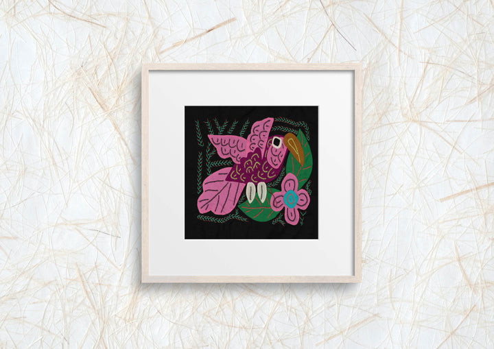 Panama molita, a pink volcano hummingbird by a blue flower on black, hand stitched reverse applique