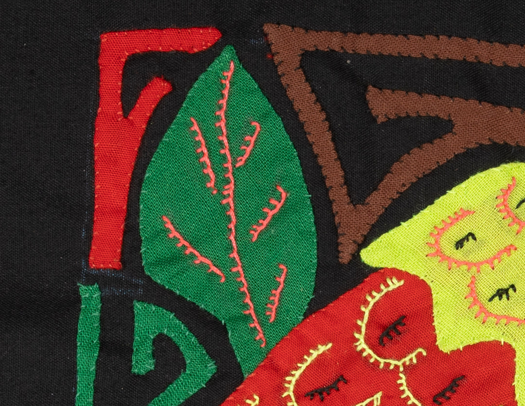 Panama molita, a white crowned parrot with a red wing on black, hand stitched reverse applique