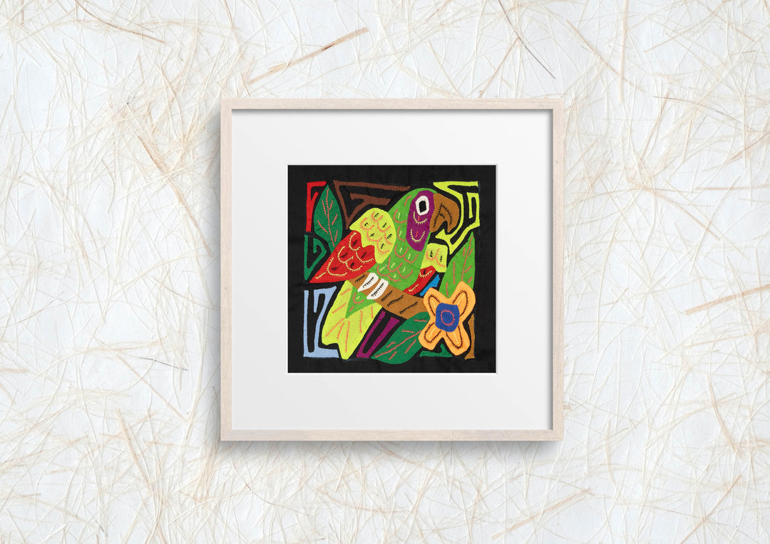 Panama molita, a white crowned parrot with a red wing on black, hand stitched reverse applique