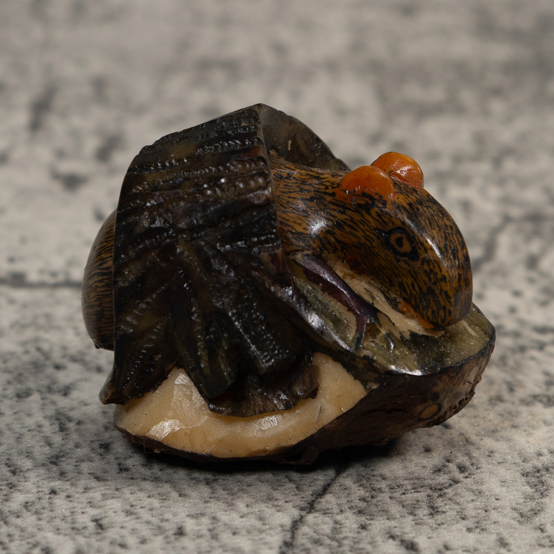 Neque Agouti In Log Tagua Carving