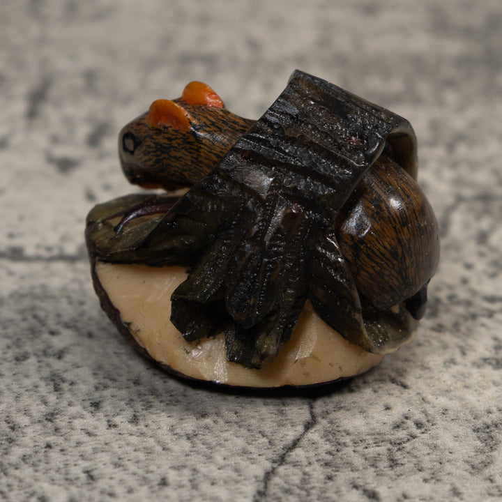 Neque Agouti In Log Tagua Carving