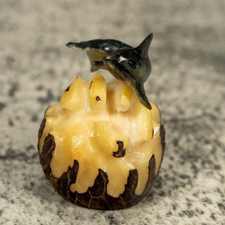 Black And Gray Dolphin Riding Waves Tagua Carving