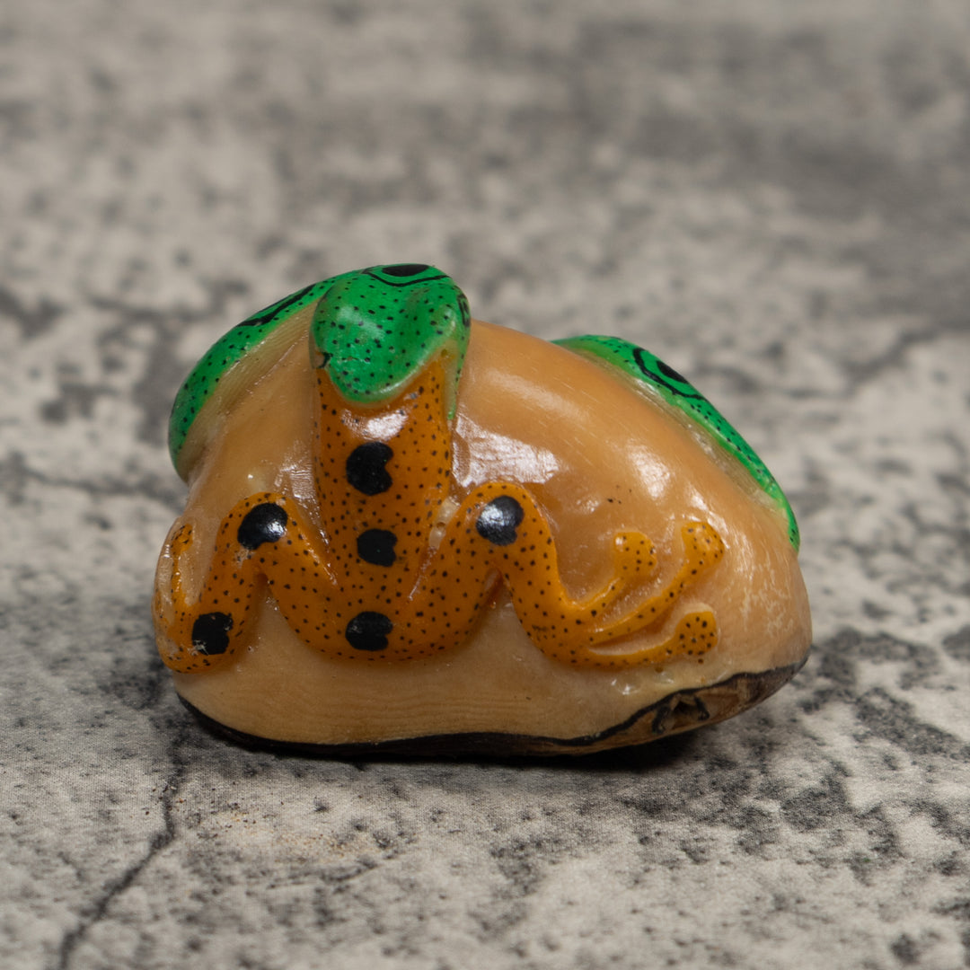 Green And Gold Snake Eating Frog Tagua Carving