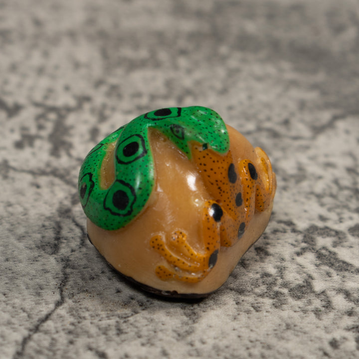 Green And Gold Snake Eating Frog Tagua Carving