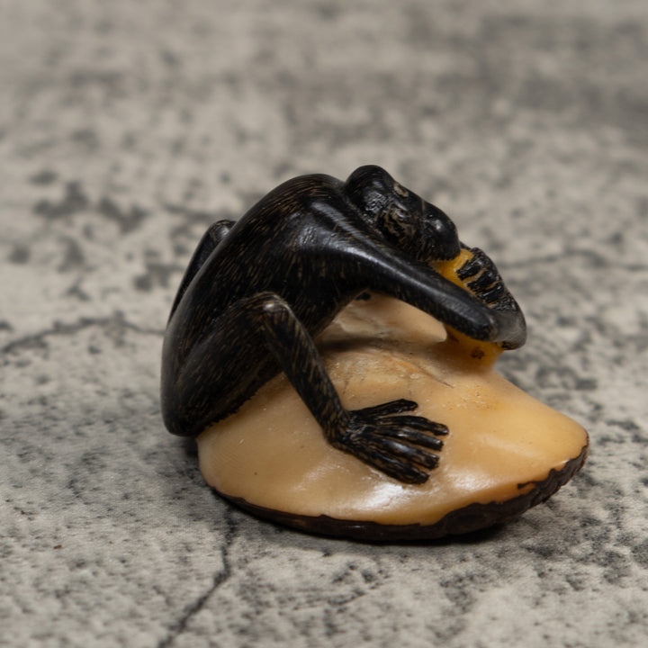 Signed Howler Monkey Eating Banana Tagua Carving