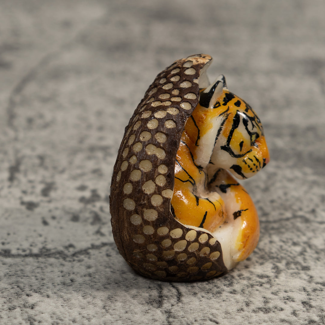 Orange And Black Bengal Tiger in Cave Tagua Carving