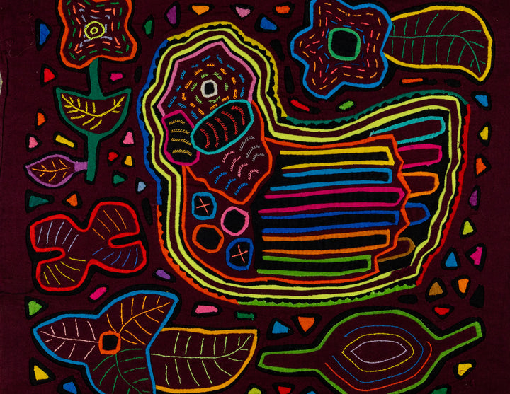 Striped rascal floating in the jungle mola, hand stitched Guna panel from Panama, 15 by 13 inches