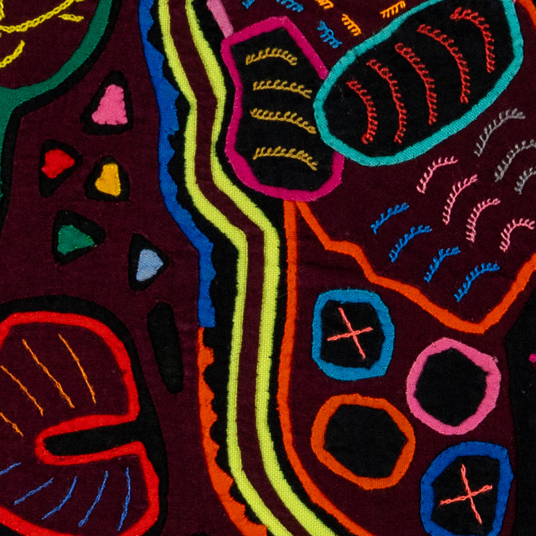 Striped rascal floating in the jungle mola, hand stitched Guna panel from Panama, 15 by 13 inches