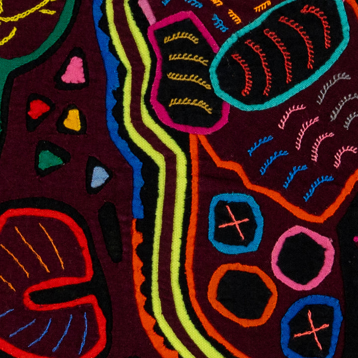 Striped rascal floating in the jungle mola, hand stitched Guna panel from Panama, 15 by 13 inches