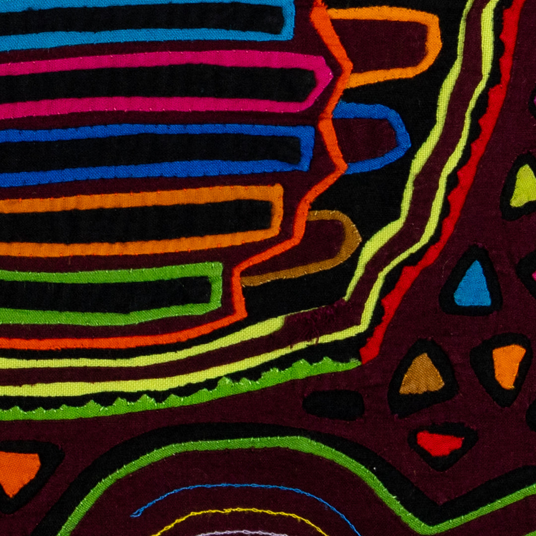 Striped rascal floating in the jungle mola, hand stitched Guna panel from Panama, 15 by 13 inches